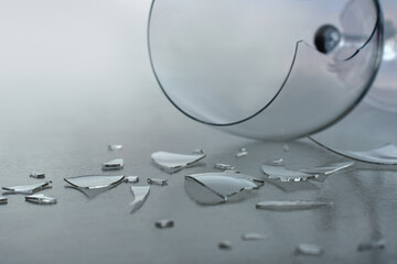 Pieces of a broken glass closeup