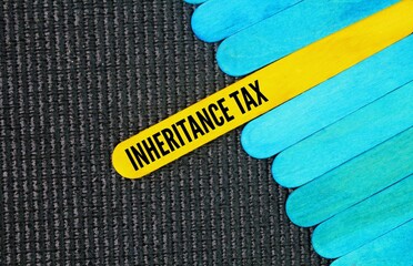 colored stick with the word Inheritance Tax. concept of inheritance tax