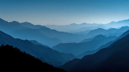 Mountain silhouette under twilight sky, serene blue tones blending into dusk, nature's quiet grandeur