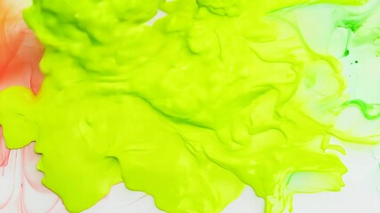 Vibrant green and red liquid mixing and flowing on white background in 4k high definition - Powered by Adobe