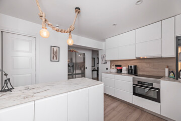  A modern kitchen with conventional furnishings could combine