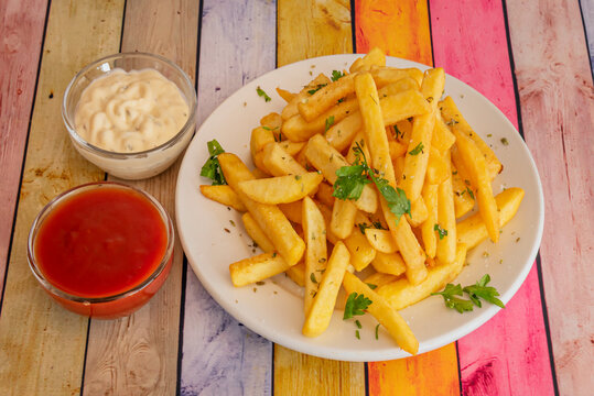 A potentially carcinogenic compound that forms in starchy foods (such as potatoes) when cooked at high temperatures, especially during deep-frying
