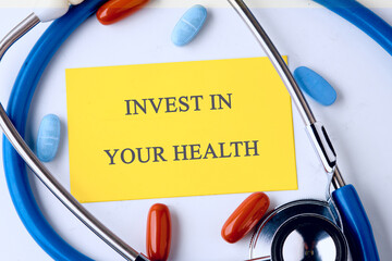THE CONCEPT PHRASE INVEST IN YOUR HEALTH. Concept health, sport, diet and fitness