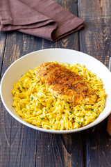 Orzo pasta with roasted chicken breast and curry sauce. Recipe. Healthy eating.