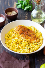 Orzo pasta with roasted chicken breast and curry sauce. Recipe. Healthy eating.