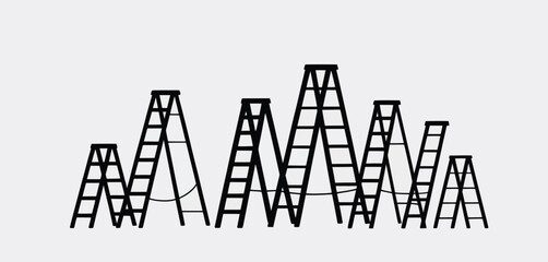 Group of black step ladders of varying sizes