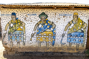 Voodoo mural paintings in a village in central Benin © Julian