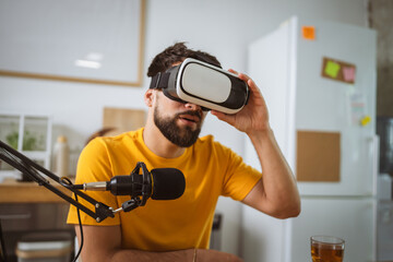 man wear virtual goggles while record podcast at home studio