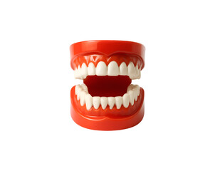 Obraz premium Red plastic teeth model isolated on transparent background