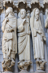 Obraz premium Notre Dame catholic cathedral, Chartres, France.North gate sculptures, 13th century. Abraham, Moses and Aaron.
