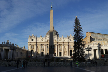 Saint Peter’s basilica, Rome, Lazio, Vatican, Italy. Obelisk and Christmas tree