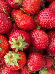 Discover Fresh and Juicy Strawberries Artistically Arranged in a Vibrant and Colorful Display