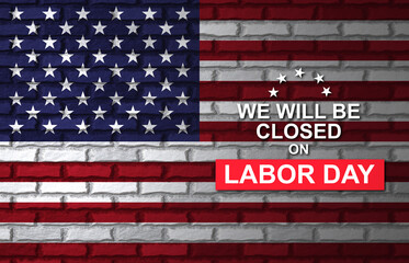 Labor Day Background. American flag painted on old brick wall with text - We will be Closed on...