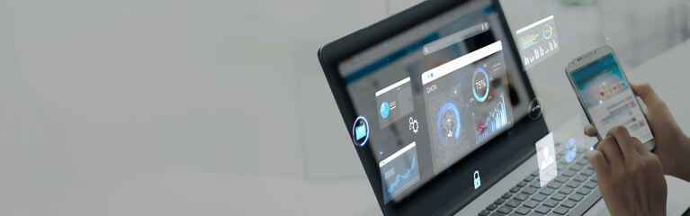 woman analyst uses a computer AI artificial intelligence and dashboard for data business analysis...