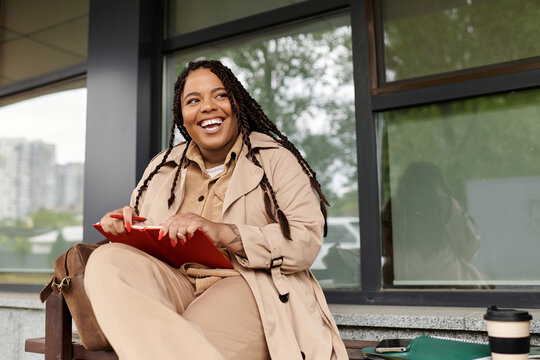 University teacher enjoying a sunny day outside while preparing for her next lecture