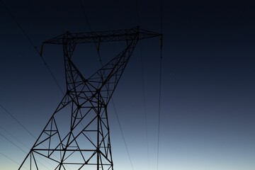 The evening electricity pylon silhouette © vectorfusionart