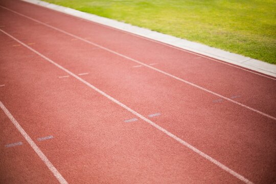 Fototapeta Focus on track on a sunny day