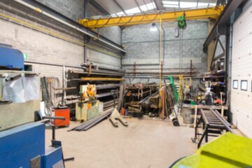 Metal fabrication workshop is being shown in flat design, featuring yellow gantry crane, copy space