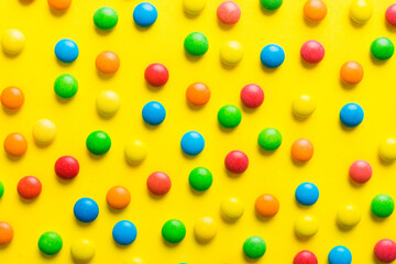 colorful candies as background top view. Seamless pattern with candy. Many sweet candies close-up