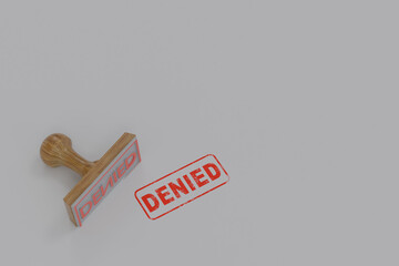 denied stamp with rubber stamper on white background.