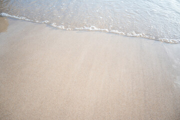 landscape view of beautiful tropical sand beach and sea in sunny day. Beach sea space area, soft focus