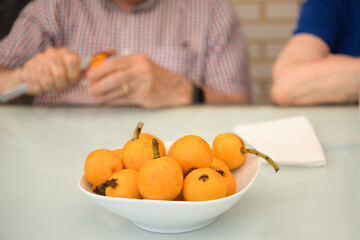 Dish with freshly picked juicy yellow nectarines