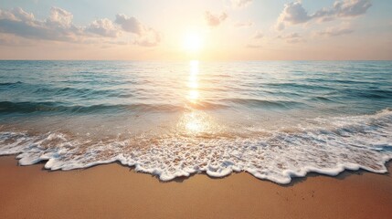 Serene dawn over gentle ocean waves with soft pink and orange sky and copy space on right