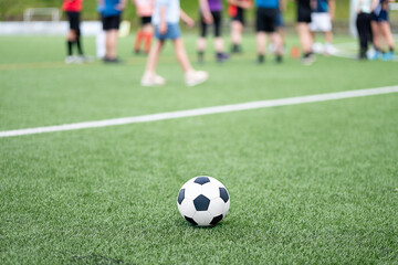 Enjoying soccer practice on a sunny day at the local sports field