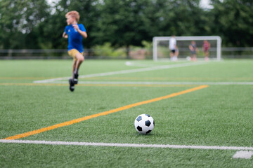 Exciting moments in youth soccer practice on a sunny afternoon