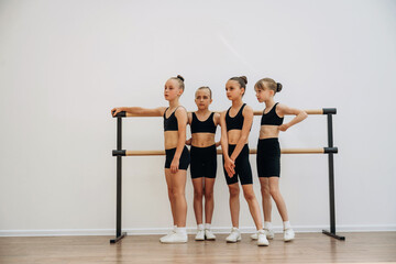 Girls practicing ballet indoors in the class