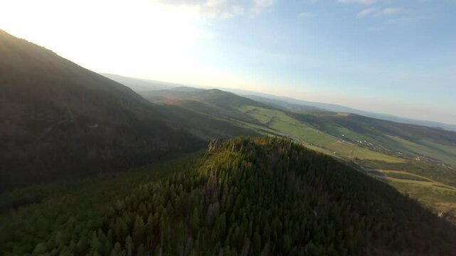 First-person drone ride along a green valley in Eastern Tatras Slovakia