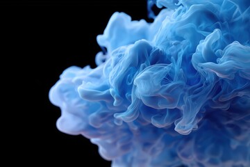 Ethereal blue smoke swirl on black background