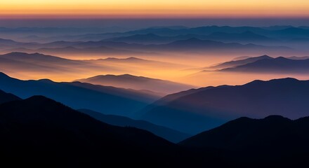 Fototapeta premium Majestic Sunrise Over Misty Mountains A Breathtaking Panorama of Serene Peaks and Golden Hues