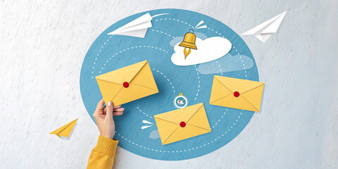 Creative Concept Showing a Hand Holding a Yellow Envelope Symbolizing Communication and Connection