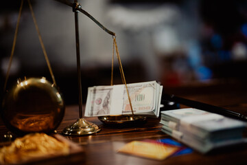 Bundles of cash and gold bars placed on justice scale, representing financial comparison, value weighing, and legal implications.