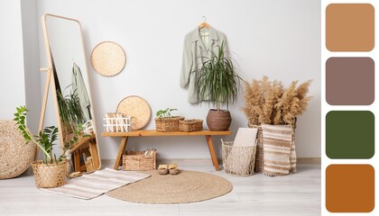 Interior of light hallway with wicker baskets, wooden bench and mirror. Different color patterns