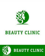 A green beauty clinic logo featuring a female face silhouette integrated with a tree and leaves 
