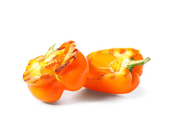 Halves of tasty grilled bell pepper isolated on white background