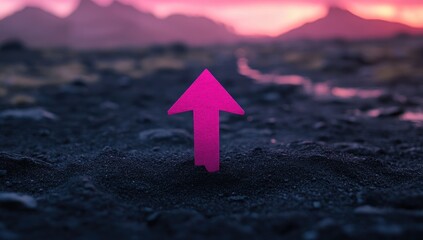 Pink arrow pointing upward on dark ground, vibrant sunset backdrop