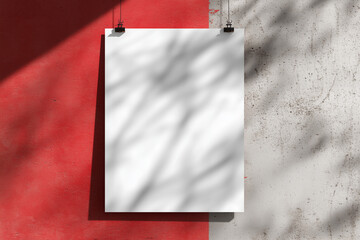 A white A1 size poster mockup on a on a raw concrete background with soft shadows. red background