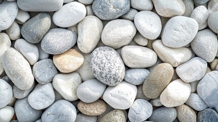 A collection of variously colored pebbles arranged in a pile.