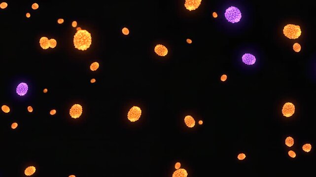 Glowing orange and purple particles moving dynamically across a black background. Ideal spooky, magical and elegant abstract background for Halloween and horror themes.