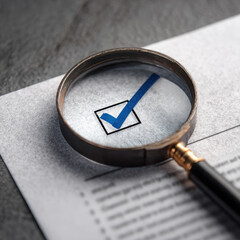 magnifying glass and check mark icon,show check the authenticity of the document,concept of rules of conduct rules and policies company regulations Terms and Conditions