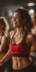 A woman in a red tank top is smiling