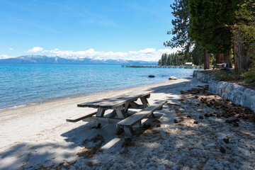 Sugar Pine Point Beach on Lake Tahoe with its beach, pine trees, and beautiful clear water.