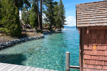 Sugar Pine Point Beach on Lake Tahoe with its beach, pine trees, and beautiful clear water.