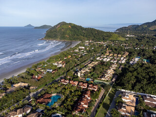 Baleia Beach with its mansions surrounded by nature on the coast of São Paulo
