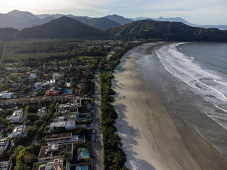 Baleia Beach with its mansions surrounded by nature on the coast of São Paulo