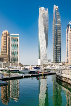Dubai, UAE &ndash; october 22, 2024: Dubai Marina, Cayan Tower, skyscrapers, yachts and boats