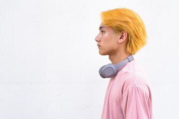 Thai gay teen man with pink shirt and septum ring
